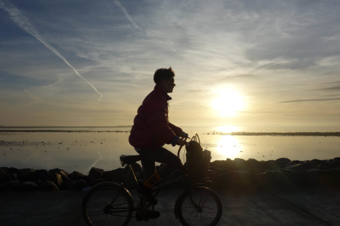 cyclist rides Galway coastline ireland bicycle